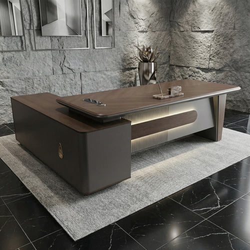 Aurelia L-shaped executive desk with modern sloped design, walnut finish, integrated wireless charging and built-in power outlets — luxury high end office desk by DreamSpace Collection Ontario.