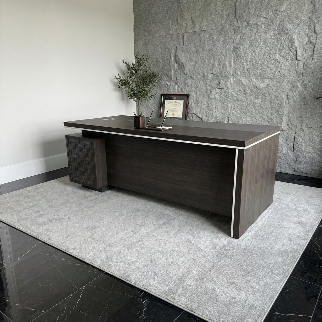 Classic walnut executive desk with return shown in a modern office setting, featuring integrated storage and clean panel detailing — luxury CEO office desk by DreamSpace Collection Ontario.